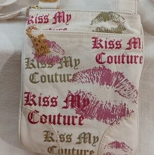 Juicy Couture "Kiss My Couture" 9x7 Canvas Crossbody Bag With A "Be Mine" Charm.